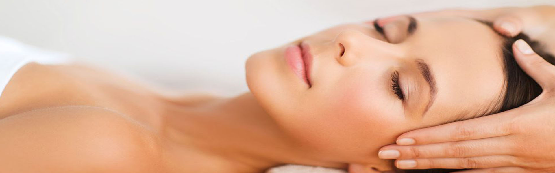 Picture of a relaxed woman laying in bed enjoying the facial therapy she received at the Guadalajara Laser Center in Guadalajara, Mexico.